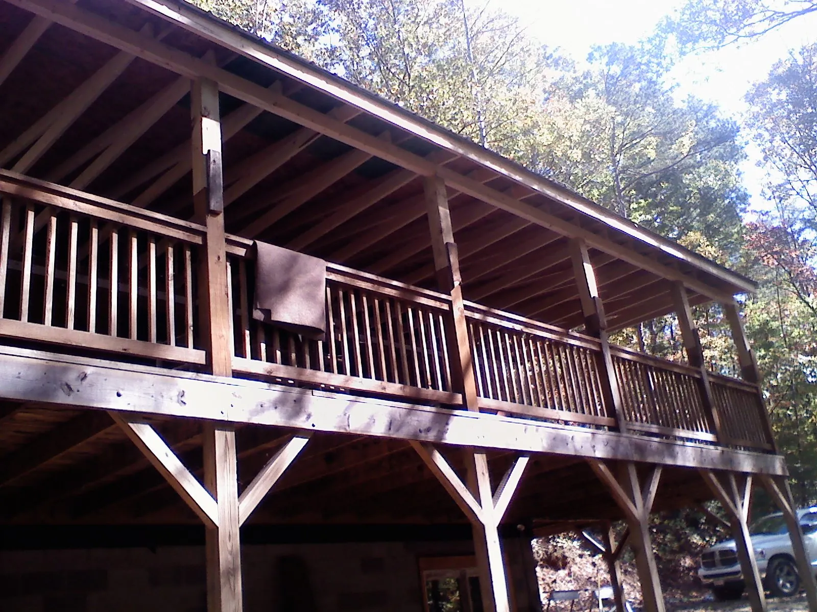 Timber framing under a new elevated porch and deck — Roof Leak Repair in Mcleod by Roofing Brothers